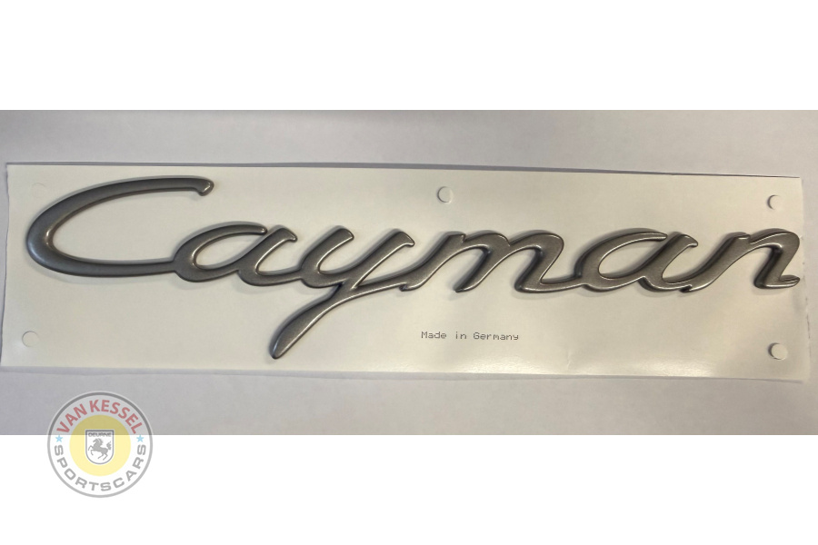 98755923900 - Embleem "Cayman" titaniumkleur